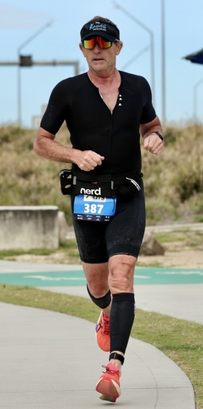 Des Trindall racing at the Moreton Bay Triathlon on his way to winning the Queensland Triathlon Series in the 55-59 age group